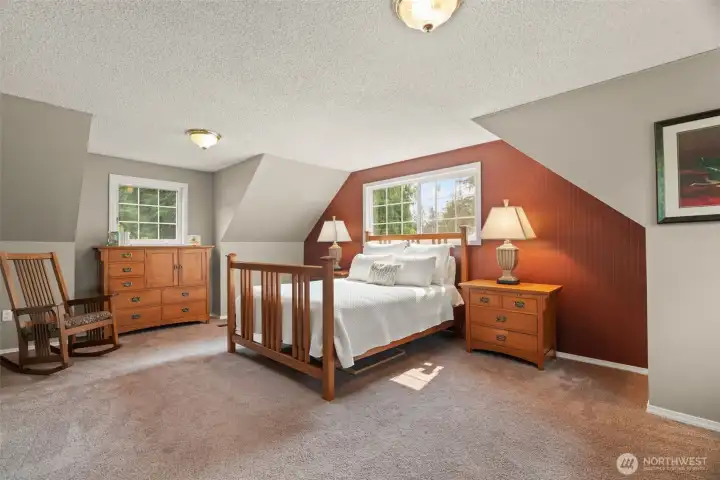 Upper level primary bedroom.
