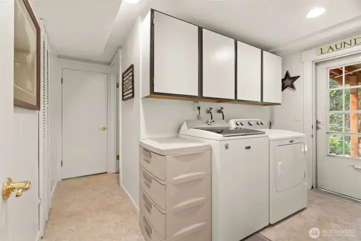 Laundry room with access to the rear yard.