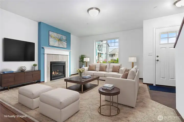 Cozy up to the gas fireplace and unwind. Virtually staged.