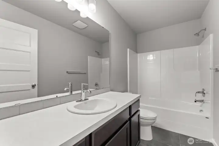 Photographs are for illustrative purposes only. Features, finishes, interior/exterior colors, landscaping and floorplan shown may vary from actual homes built.