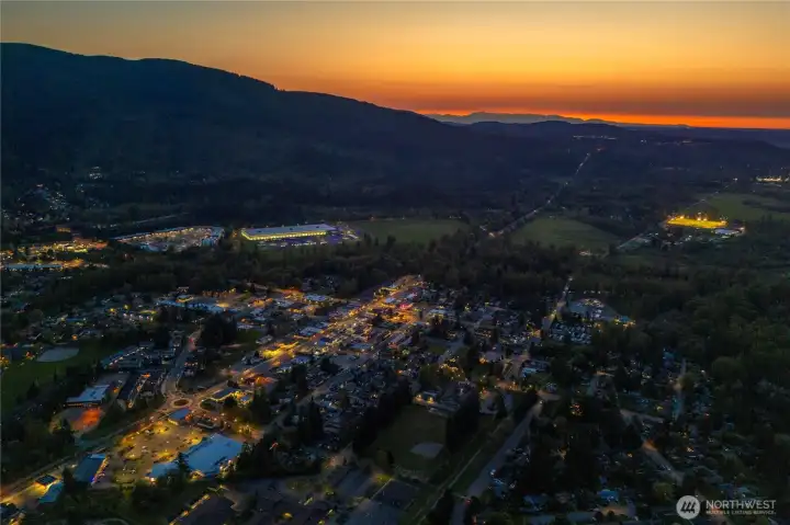 North Bend is a lovely, slow-paced town with iconic front-row vistas of Mount Si and offers a peaceful setting for bakeries, diners, antiques, and a Premium Outlets selection of stores. There’s an impressive array of hiking & bicycling trails and paths, including the most famous, popular hike in Washington State, the Mount Si Trail, an 8-mile round trip hike with an elevation gain of 4,000+ feet. Make sure to visit the beautiful 17+-acre Torguson Park sports fields and skate park.  Are you hungry? North Bend was made famous by David Lynch’s TV series Twin Peaks – the show that immortalized Twede’s Cafe and its cherry pie and ‘damn fine cup o’ coffee,’ which you can still enjoy today! You’ll also love Huxdotters Coffee (voted the best in the valley), Pressed on Main (an organic juice shop), North Bend Bakery, and the new Friends & Co. Ice Cream Shop.  Enjoy Snoqualmie Falls, Snoqualmie Casino & Hotel, and the Salish Lodge & Spa in the charming town of Snoqualmie