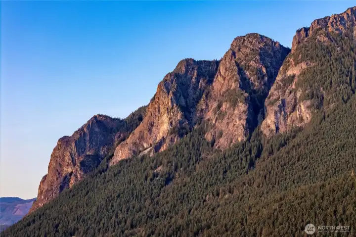 There are many reasons – besides its proximity to Seattle – why Mount Si is the most popular hike in the state: beautiful views, wildlife (some of it not so wild), old growth forest, and a dramatic summit worthy of a more remote peak. Rising dramatically above the Snoqualmie Valley, it serves as a literal and figurative gateway to the Cascades for thousands of hikers.