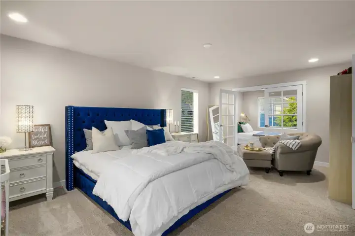 Upstairs, the expansive primary awaits, offering a large walk-in closet with organization and a lovely en suite bath with dual vanities, walk-in shower and soaking tub. Another bedroom connected through French doors could also be a nursery or large sitting room.