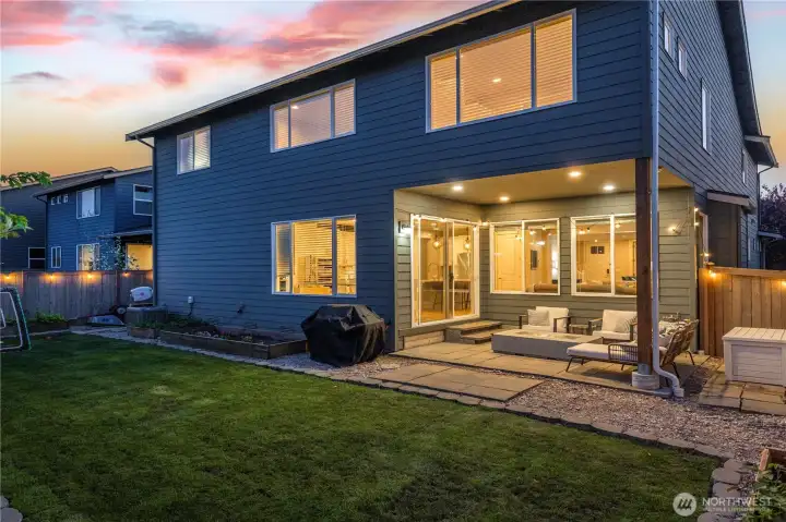 back of the house pictured is the covered outdoor living space and the upper room is the newly permitted 5th bedroom or office, sitting space or nursery planning??
