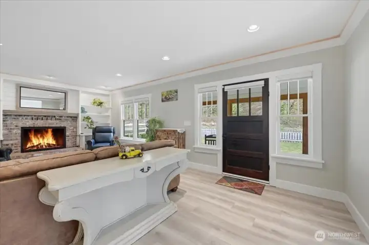 Living room with propane fueled fireplace insert creates a warm inviting atmosphere.