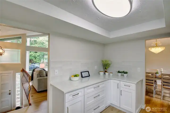 Fully remodeled kitchen, new flooring, new soft close shaker cabinetry, gorgeous quartz countertops, new appliances, back splash and lighting.  Imagine meal prepping here...fantastic!