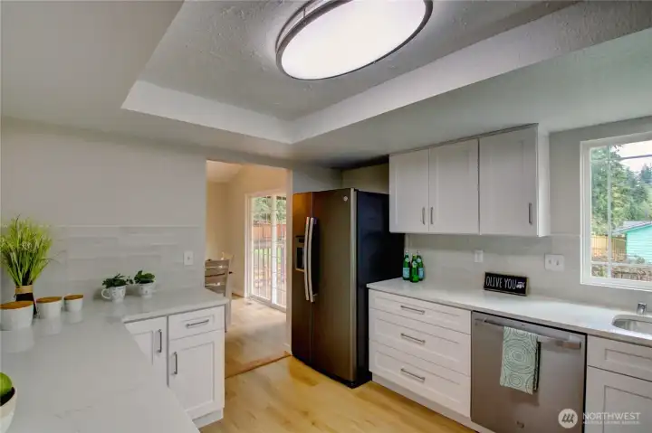 An abundance of cabinetry and quartz countertops - its so pretty!