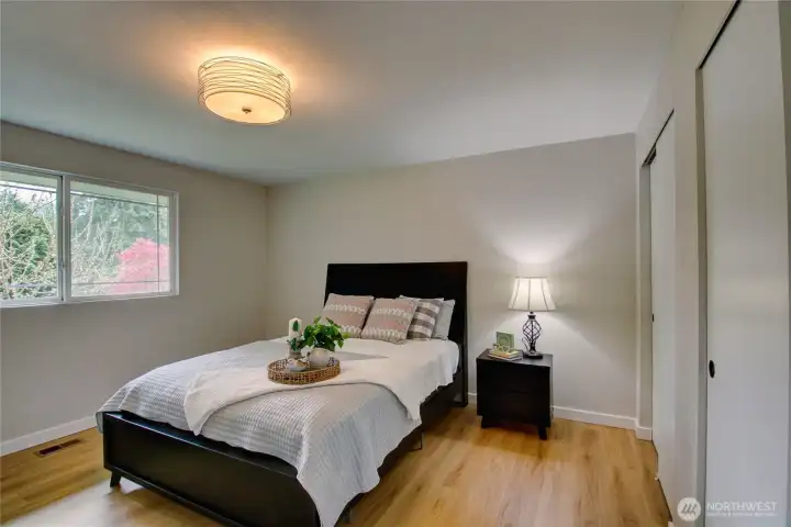 Plenty of room in this lovely primary suite for a King sized bed