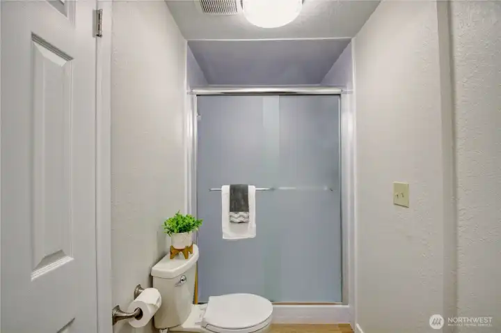 The other half of the primary ensuite with walk-in shower