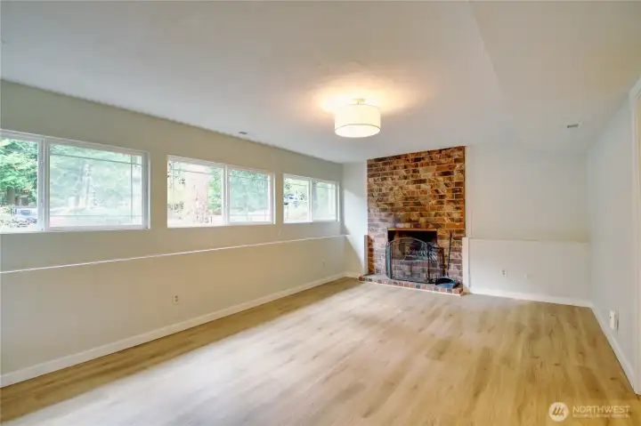Large recroom with wood burning fireplace
