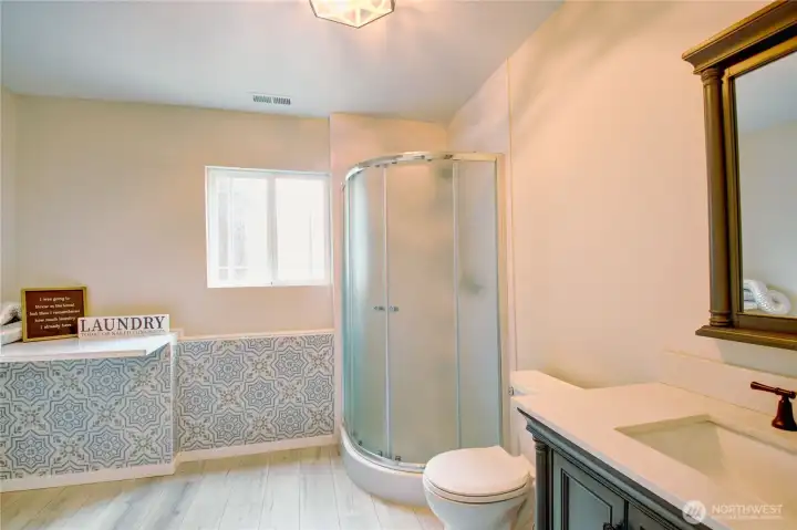 Downsstairs 3/4 bathroom and laundry