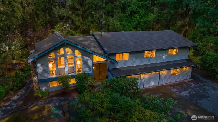 Welcome home . . . 6 beds, 3,300 sq feet, a detached shop, a TRUE oasis!