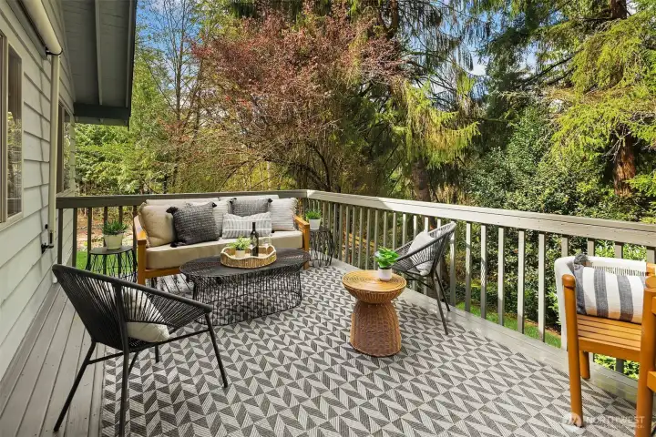 The deck runs the length of the home & was refinished w/the railings just repainted.