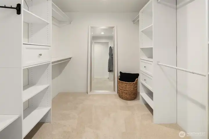 Primary walk-in closet w/custom organizer.