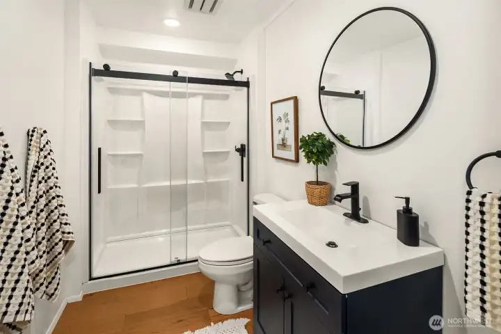 Downstairs bath with new walk-in shower.