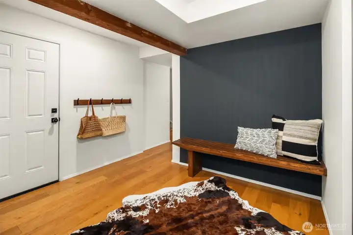 Mudroom, located right off the garage for everyday ease. Storage closet makes for easy organization for all the gear.