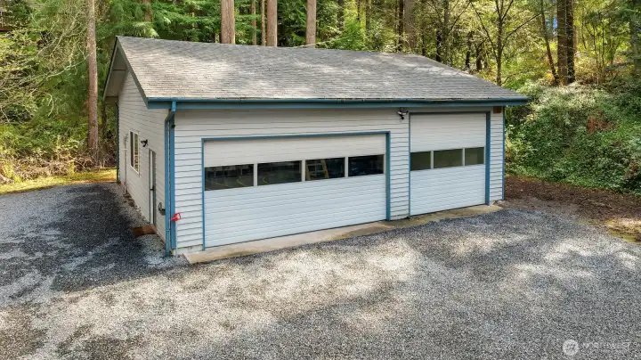 960 sq foot detached shop w/new windows, electrical, heat & a newly built mezzanine.