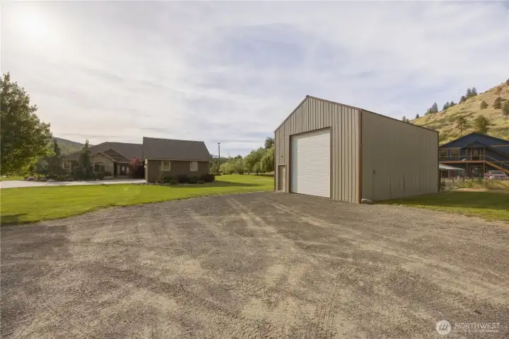 684 SF pole building with 14' tall door (has climbing wall inside!)