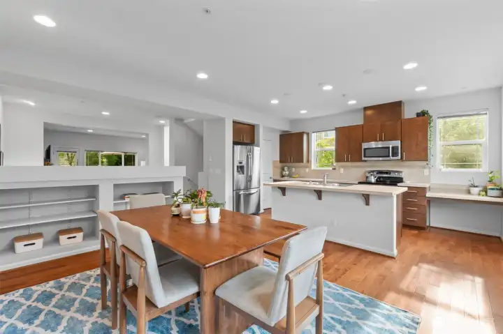 Wall to wall windows in spacious kitchen and dining area, plus tons of storage with both pantry and built-in storage nooks. Wall to wall windows in spacious kitchen and dining area, plus tons of storage with both pantry and built-in storage nooks.