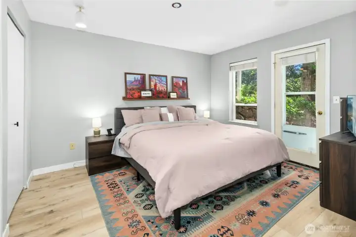 spacious primary suite with 2 closets