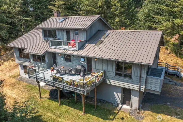 East side with multiple decks to take in sunshine and views East side with multiple decks to take in sunshine and views