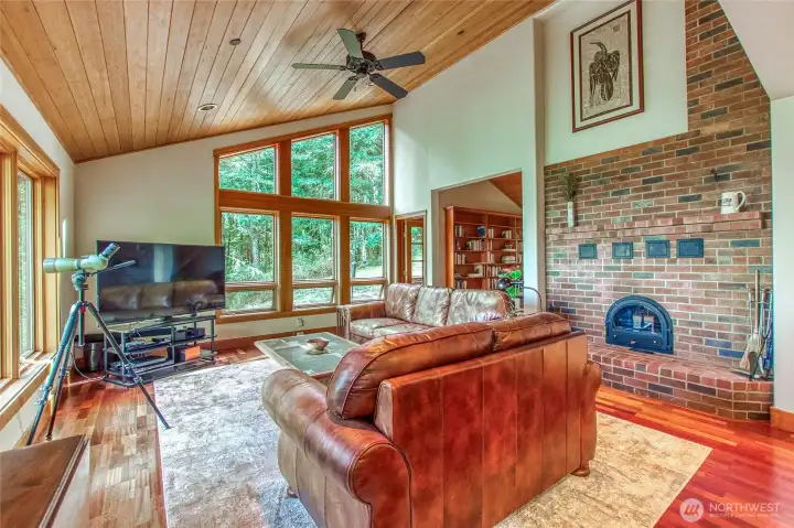 Another view of great room with masonry heater/fireplace wall and opening to Library= Another view of great room with masonry heater/fireplace wall and opening to Library=