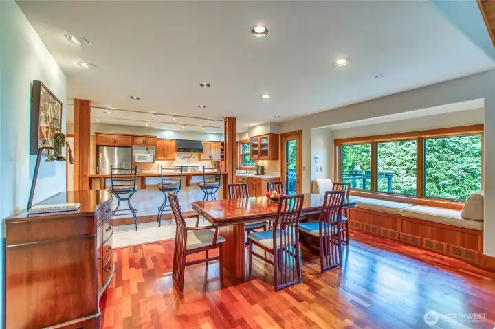 Dining room has an inviting window seat with storage. Cushions are included. The exterior door conveniently leads to the deck for grilling and alfresco dining Dining room has an inviting window seat with storage. Cushions are included. The exterior door conveniently leads to the deck for grilling and alfresco dining