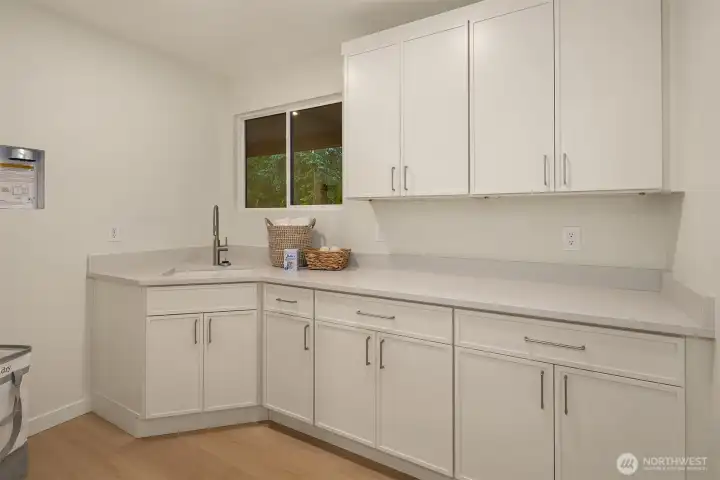 lower level laundry room for main house