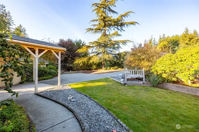 Paved driveway and walkway to the front door...