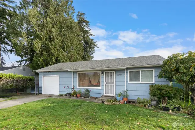 One car attached garage plus driveway parking.