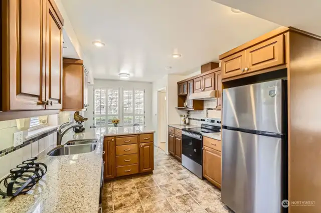 solid surface counters and undermount sink make food prep a breeze