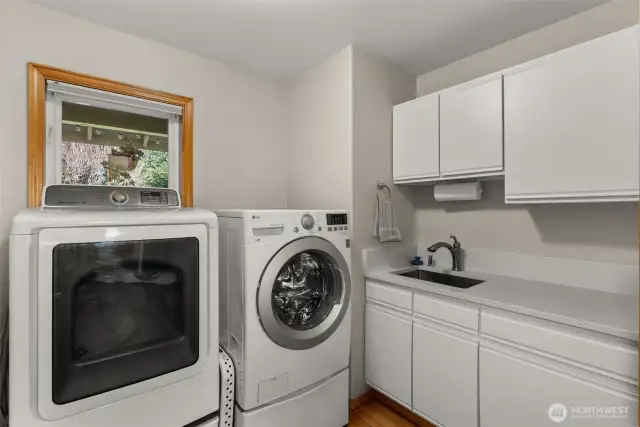 The laundry room is right off the garage entry making drop off and pick up of "all the stuff" a breeze.