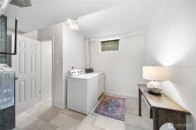 Open & roomy utility & laundry area.
