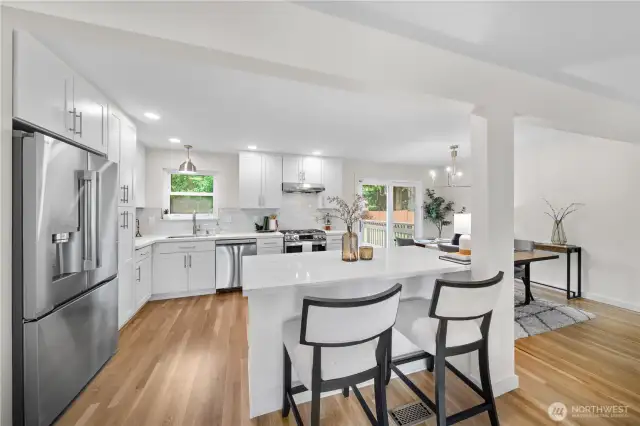 Stunning open concept kitchen flows perfectly into living & dining rooms.