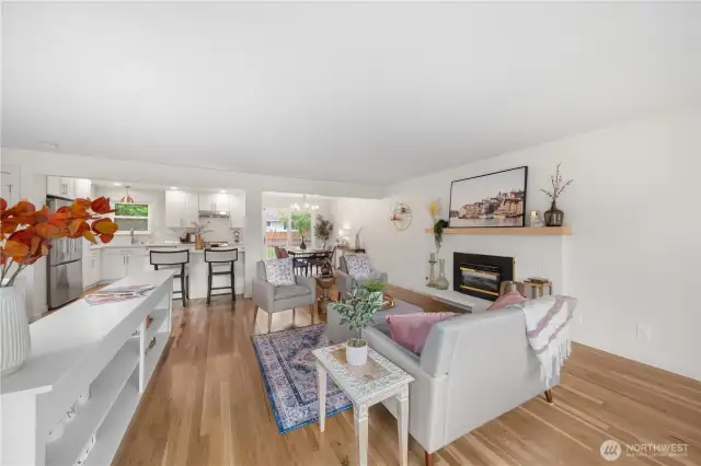 Stunning newly finished white oak hardwoods run throughout the main floor.