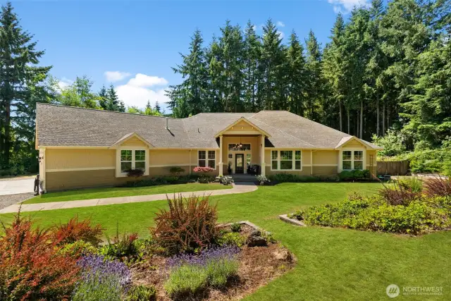 Perched on a beautifully landscaped 1.27-acre lot, this timeless gem is a rare find. With main-level living and meticulously curated grounds, it’s a home that’s easy to fall in love with.