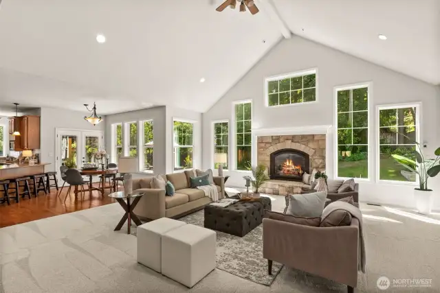 The kitchen and casual dining area sit adjacent to this cozy room making entertaining a breeze!