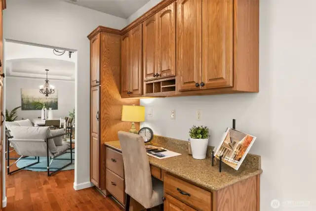 A convenient nook off the kitchen offers additional storage—perfect for daily essentials, your computer, and favorite cookbooks.