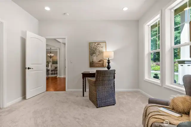 A front flex room can be utilized as an office or bedroom.  An ensuite 3/4 bathroom and walk in closet make this a perfect guest suite separate from the bedrooms on the other side of the house.