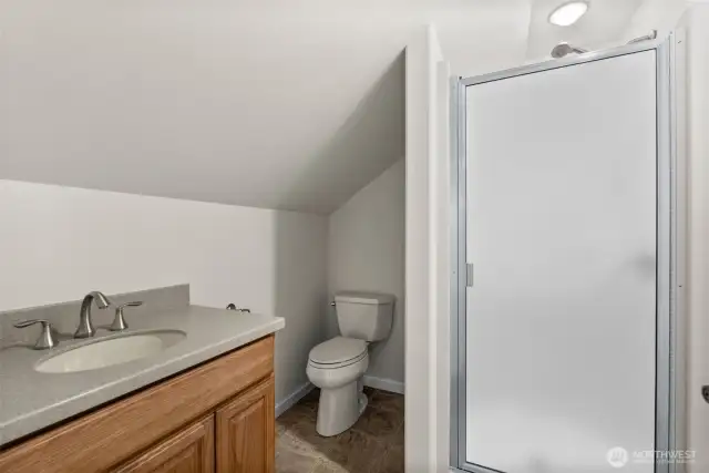The three-quarter bathroom off the upper-level bonus room is convenient without having the to go to the main level.