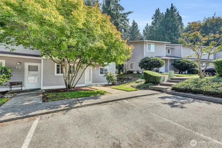 End-unit townhome tucked next to landscaped open green space.