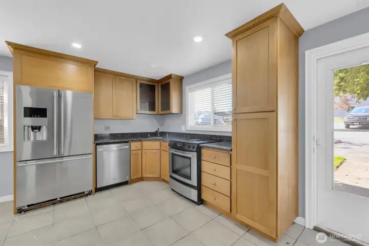 Sleek granite countertops and full stainless steel package