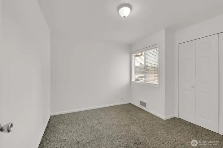 Spacious primary bedroom.
