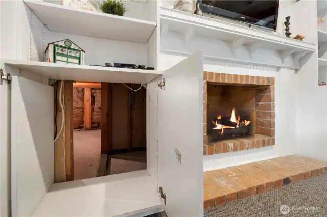 And, we have a SECRET ROOM! through the cabinet doors, you'll find a 9x7 room for extra storage or whatever...
