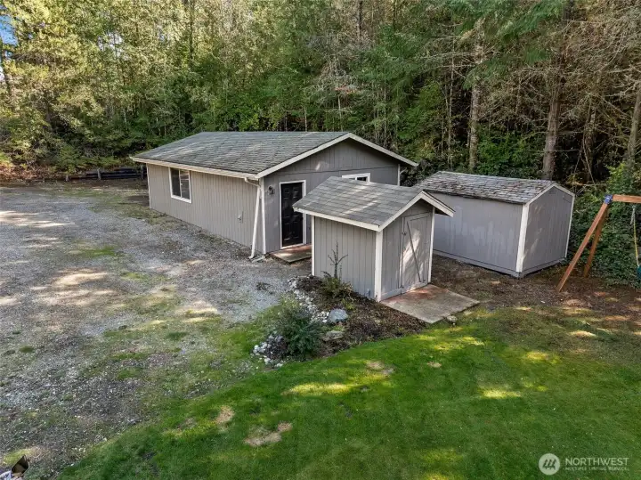 Detached garage and outbuildings.