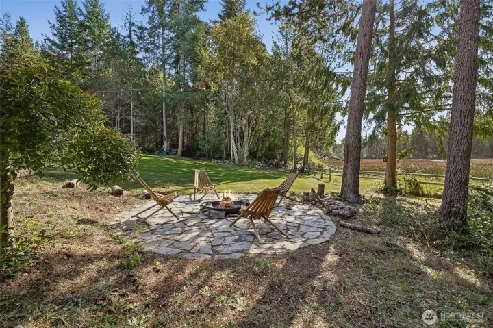 Another view of the fire pit and back yard.