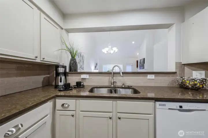 Great look out to living room & pass thru to dining room