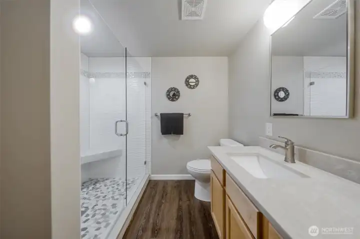 Gorgeous, updated,  ensuite bathroom with dual sink vanity & stunning updated shower