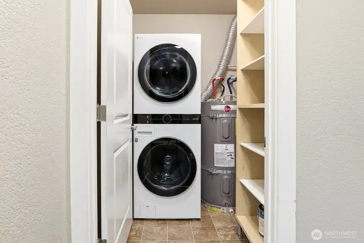 Full sized washer/dryer and storage closet.