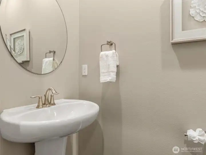 Main level powder room just off the front hall
